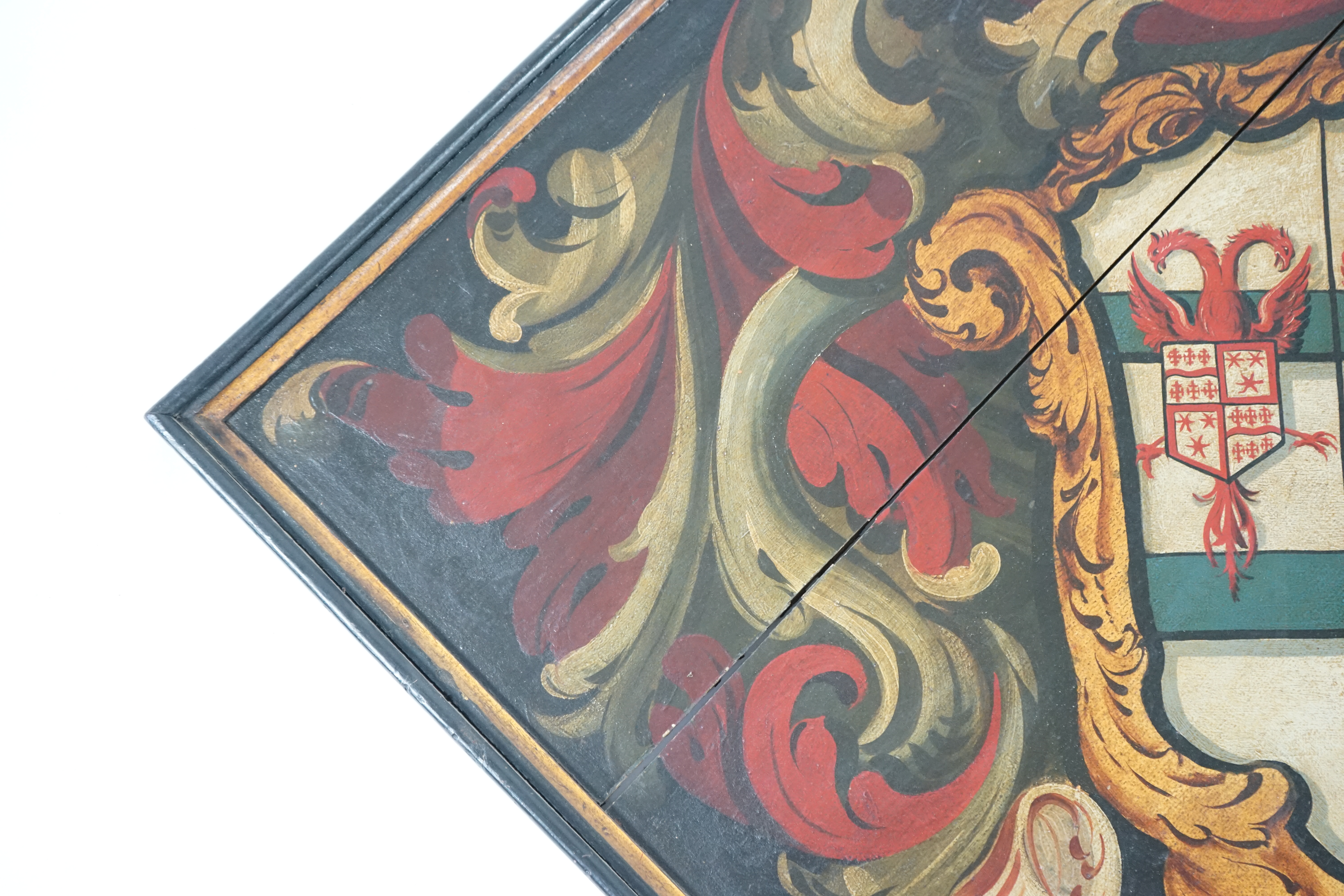 A late 18th / early 19th century oil on wooden panel hatchment